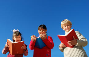 Three kids reading