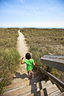 girl walking down a path