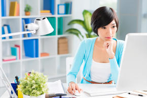 teacher working on a computer